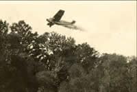 Aircraft spraying insecticide, 1920's