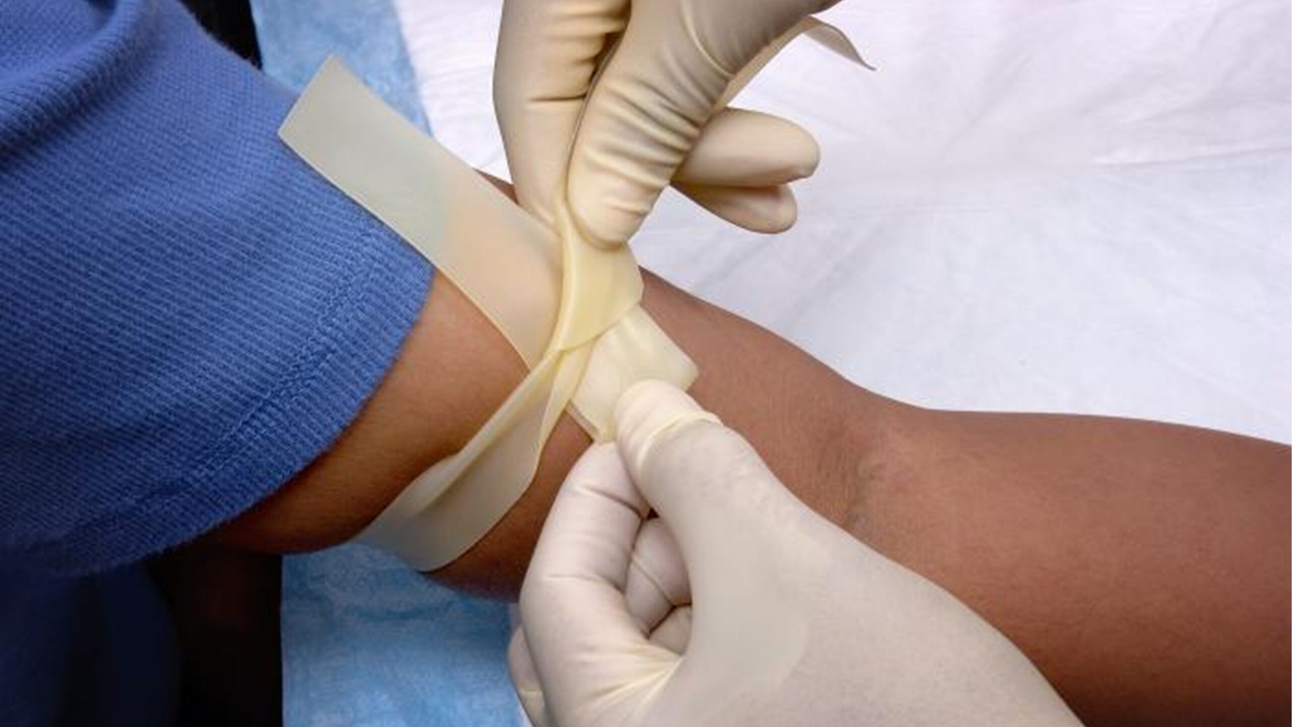 A healthcare provider drawing blood for diseases diagnostic purposes.