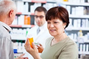 Anticoagulants woman in pharmarcy