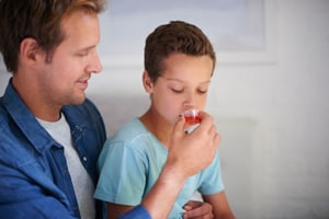 Photo of Dad and Son with Dosing Cup