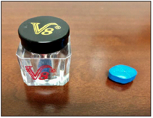 The figure is a photo showing a jar of “V8,” a male enhancement supplement purchased from a convenience store in Virginia in 2019 and one of the blue tablets from the jar. 
