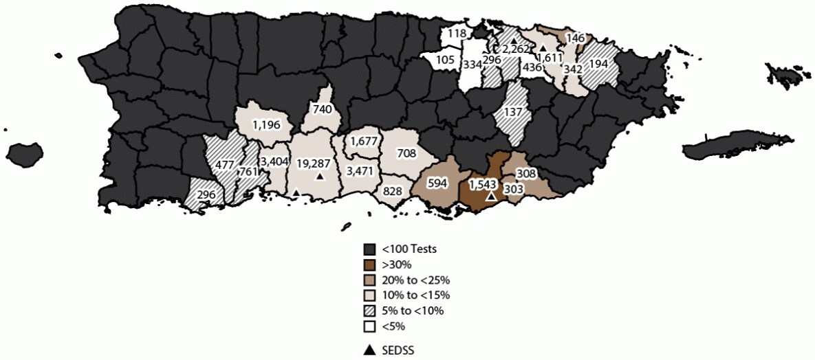 The figure is a map of Puerto Rico that illustrates the number and proportion of acute febrile illness cases with participants testing positive for any arbovirus during 2012–2022, by municipality. The data are from the Sentinel Enhanced Dengue Surveillance System.
