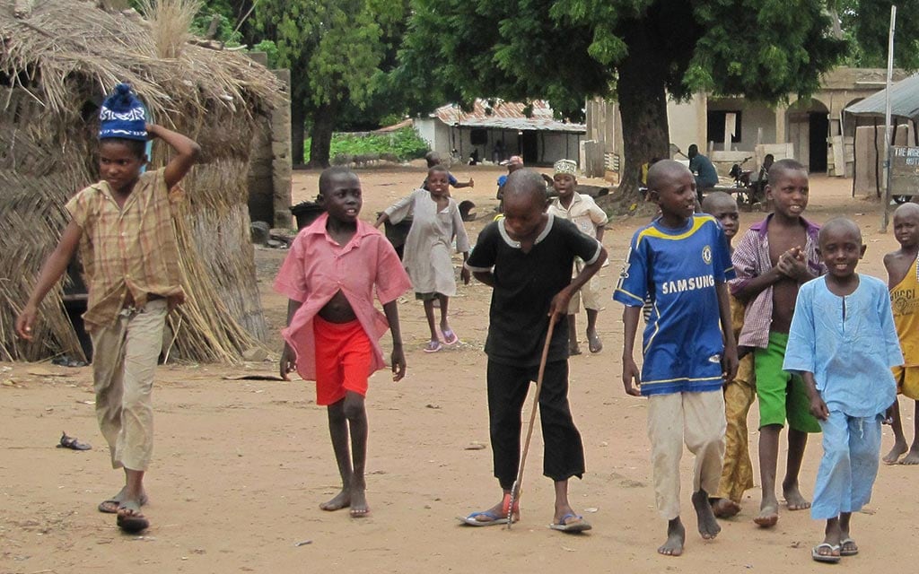 Village children playing outside.