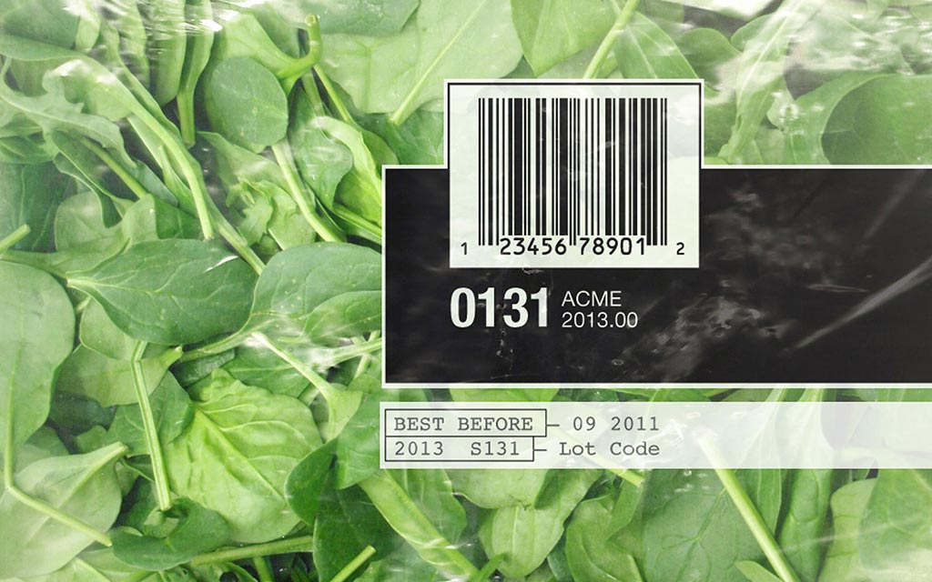Lot numbers and labeling found stamped on the outside of produce packaging.