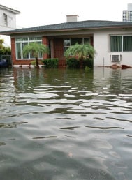 flood waters surrounding a home