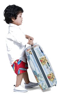 boy carrying a suitcase