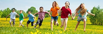 Group of children playing in a field