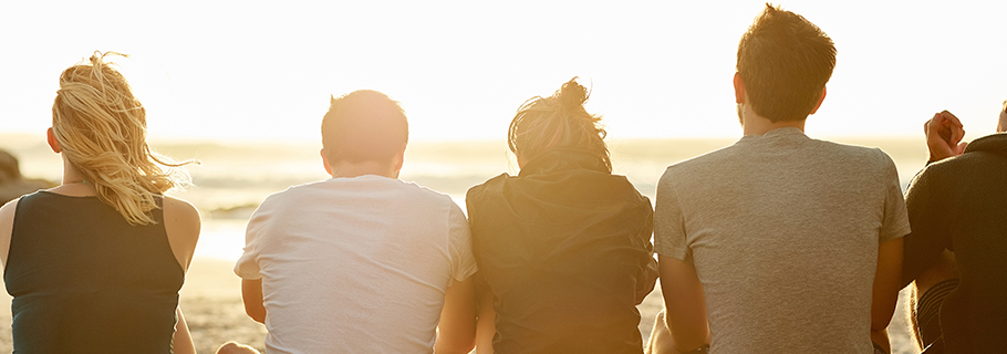 Group Of Friends Enjoying Meal Outdoors At Home Group Of Friends Enjoying Meal Outdoors At Home