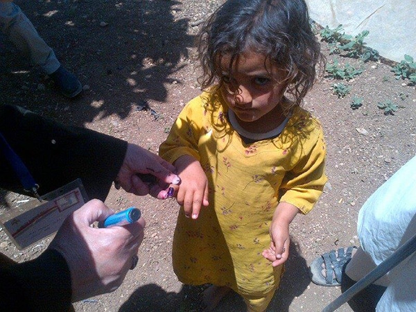 Child receiving polio vaccination