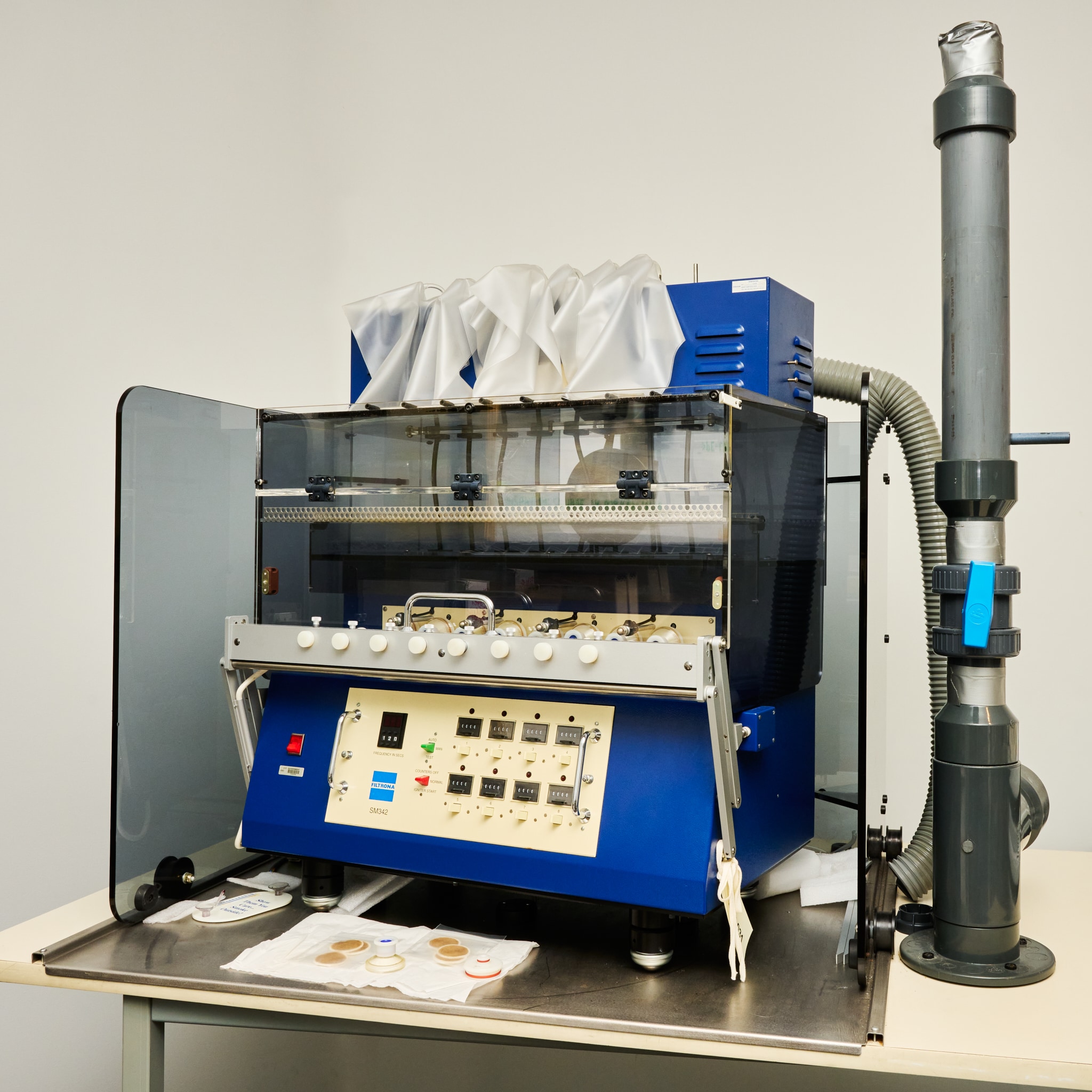 Harmonized 8 Channel Smoking Machine (1994) that was used by the CDC Tobacco Laboratory till the early 2000s