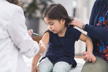 Child receiving chickenpox vaccination