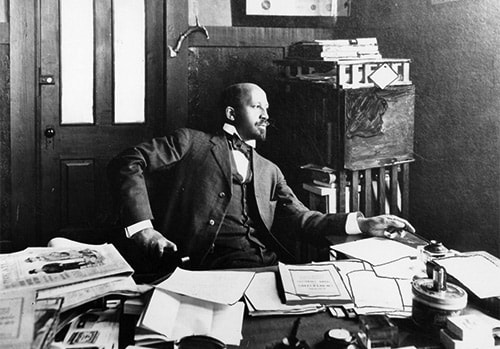 University of Massachusetts Amherst Libraries - Visionary sociologist and civil rights activist W.E.B. Du Bois (1868-1963) in his Atlanta University office, 1909 - DuBois was among the first to note that the health disparities of American blacks stemmed from social conditions and not from inherent racial traits. He provided empirical evidence that linked the legacy of slavery and the inherent racism of American society to the poor health of blacks.