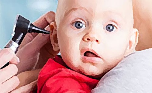Infant getting an ear exam