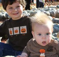Little boys at the pumpkin patch