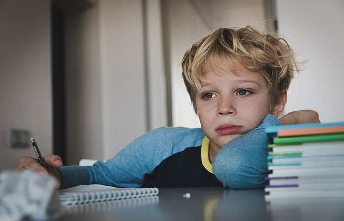A child frustrated with his school work, some children have inattention and many worries