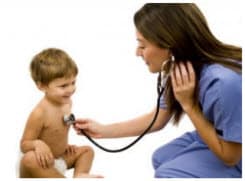 Photo: physician listening to toddler