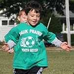 Nicholas playing soccer