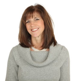 Woman in a grey sweater