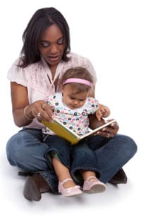 Mother reading to toddler
