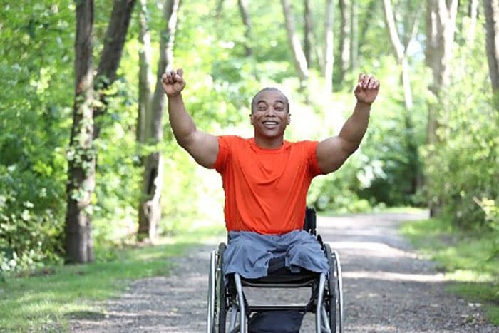 Man in a wheelchair in a park