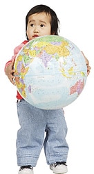 Toddler holding a globe