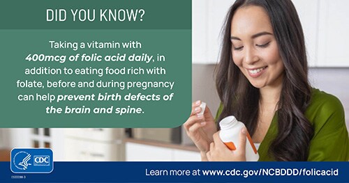 A woman with a bottle of folic acid