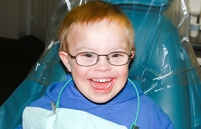 Boy With Down Syndrome At Dentist