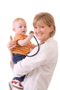 Photo: Physician holding a baby boy
