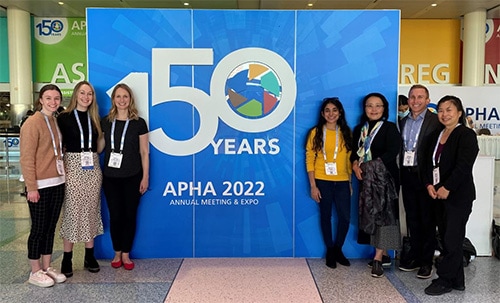 Disability Science and Program team members gather in the exhibit hall at the 2022 APHA Annual Conference.