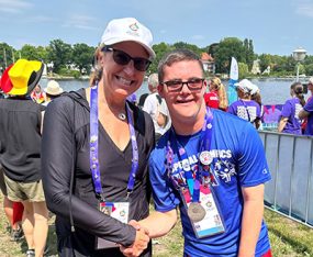 Dr. Rattay congratulates Caleb Guy on his silver medal win in the 200-Meter Tandem Kayaking event (Raven Allen, fellow silver medalist, not pictured)
