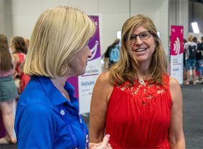 DHDD Director Dr. Karyl Rattay (right) meets with Special Olympics CEO Mary Davis (left)