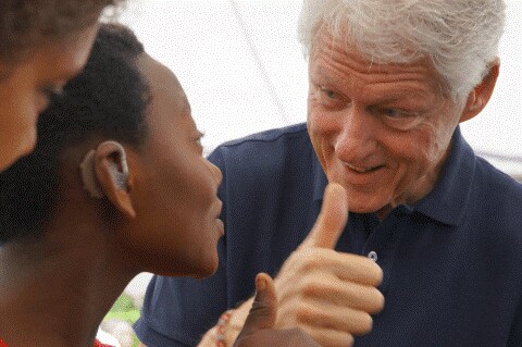 Photo of Bill Clinton using sign language