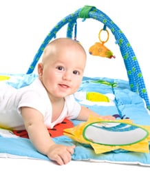 Baby on play mat