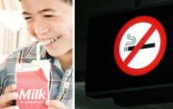 Child drinking milk and smiling and a No Smoking sign