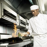 Photo of a chef cooking.