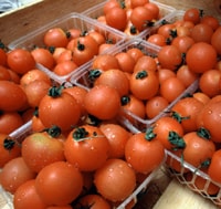 Photo of whole tomatoes.