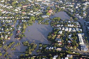 Aerial view shows city with massive flooding in the streets. 