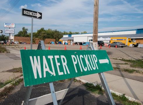 A sign reading 'water pickup'