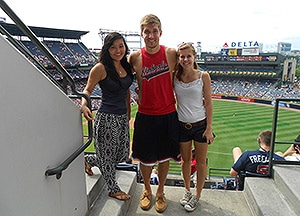 interns enjoying an Atlanta Braves game
