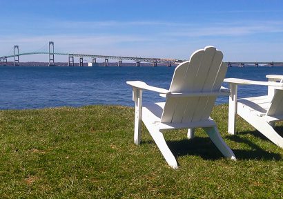 Deck chairs overlooking Rhode Island body of water
