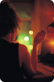 Woman smoking in night club