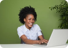 Woman using laptop computer