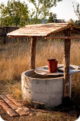 Water well with bucket