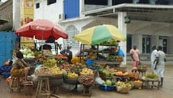 sidewalk fruit seller in sierra leone