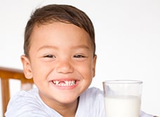little boy drinking milk