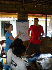Poxvirus team members educate the local community on monkeypox disease surveillance