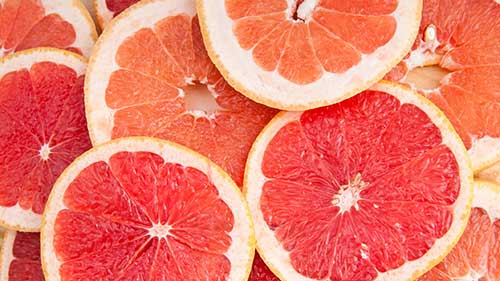 Photo of sliced grapefruit.