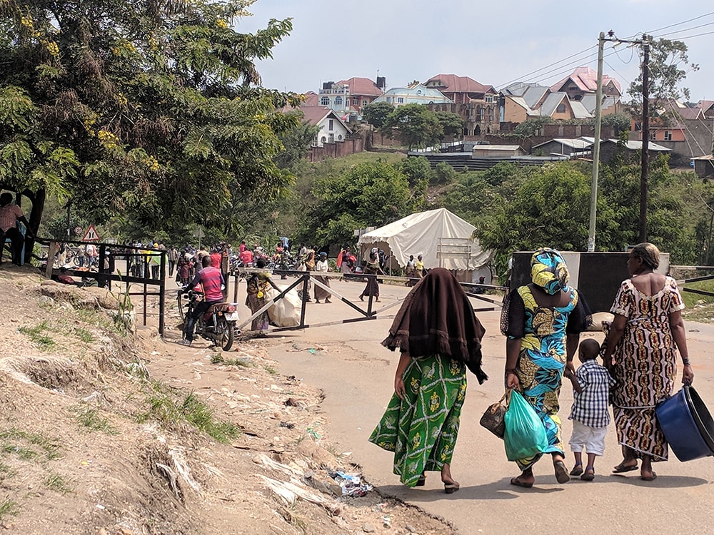 People walking in Mpondwe, Uganda