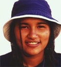 Young American Indian wearing a hat