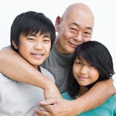 Asian man with two Asian youths